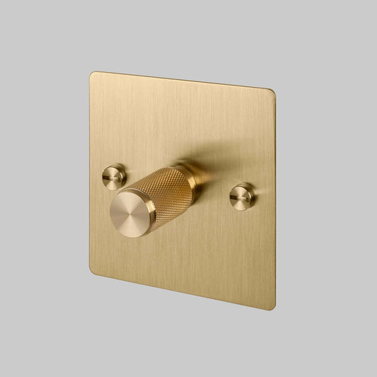 1G Dimmer/ 100W/ Brass with brass details, angled view.