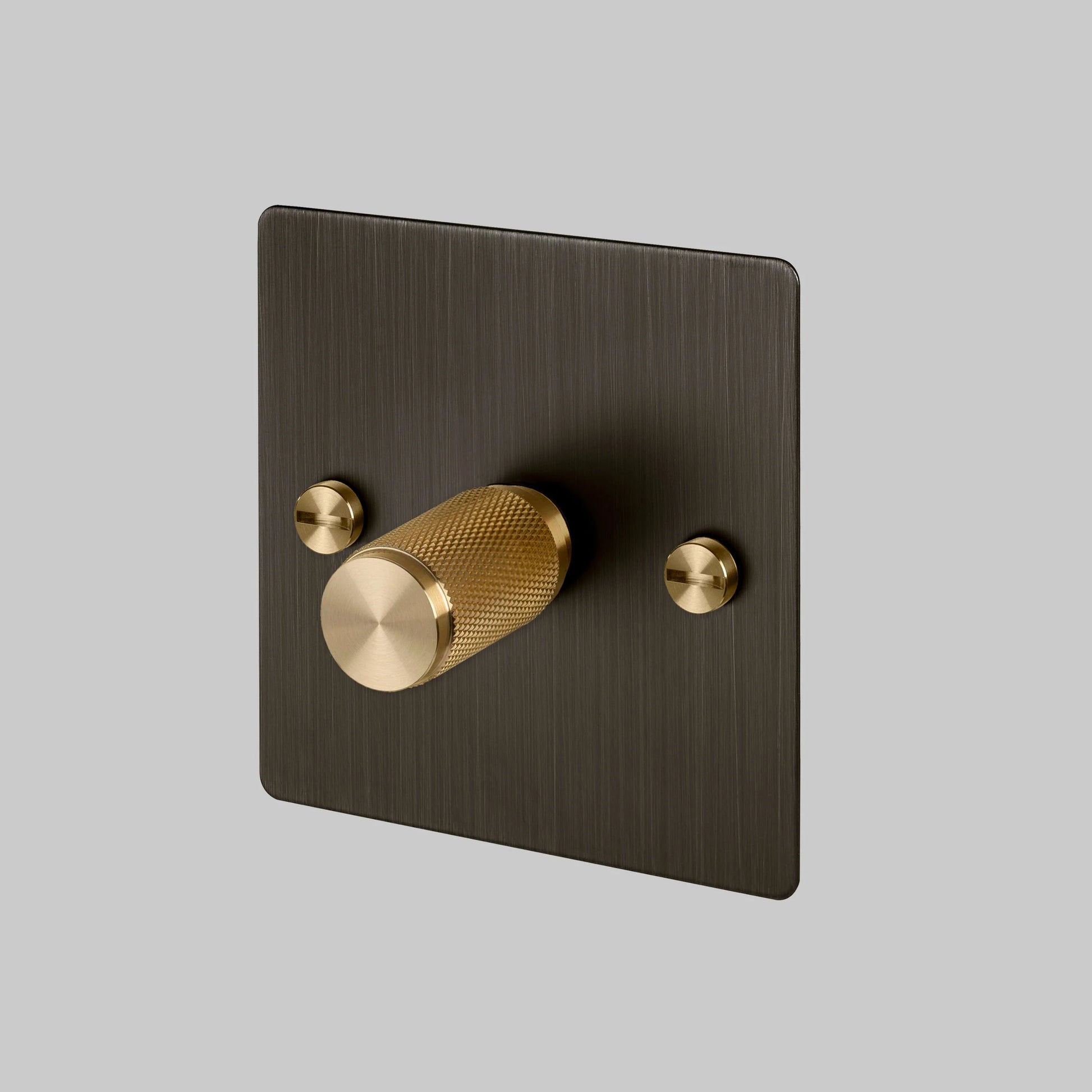 1G Dimmer/ 100W/ Smoked Bronze with brass details, angled view.