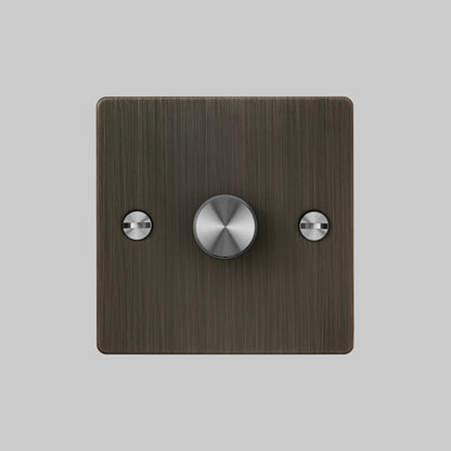 1G Dimmer/ 100W/ Smoked Bronze with steel details, front view.