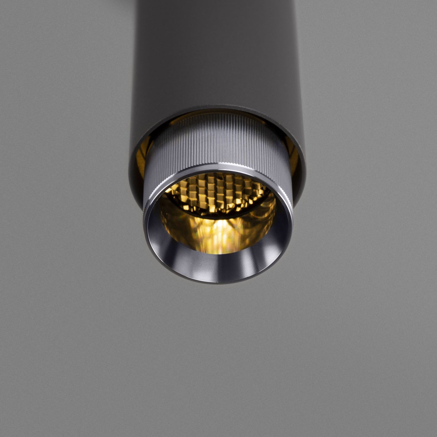 Exhaust Pendant Light / Linear / Graphite Steel, detailed close up view of kurling and light.