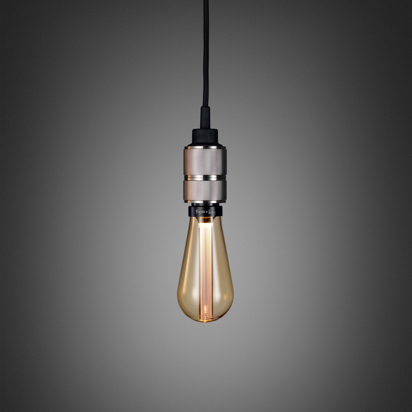 Hooked 1.0 Pendant Light / Nude Steel, front view with gold bulb.