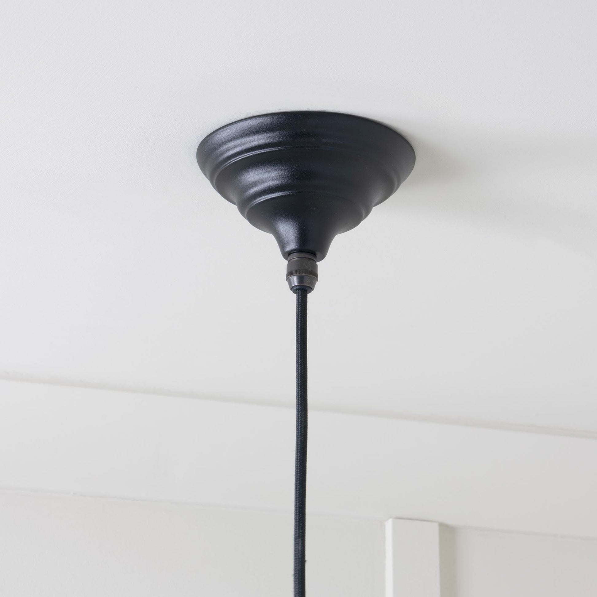 Hammered Nickel Hockley Pendant Light Elan Black, close up view of fitting and cable.