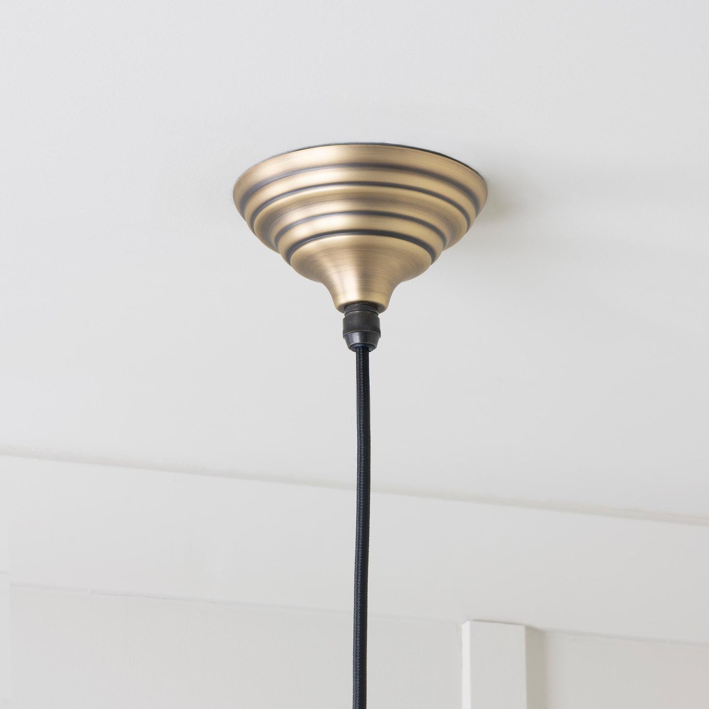 Aged Brass Harborne Pendant Light, close up view of fitting and cable.