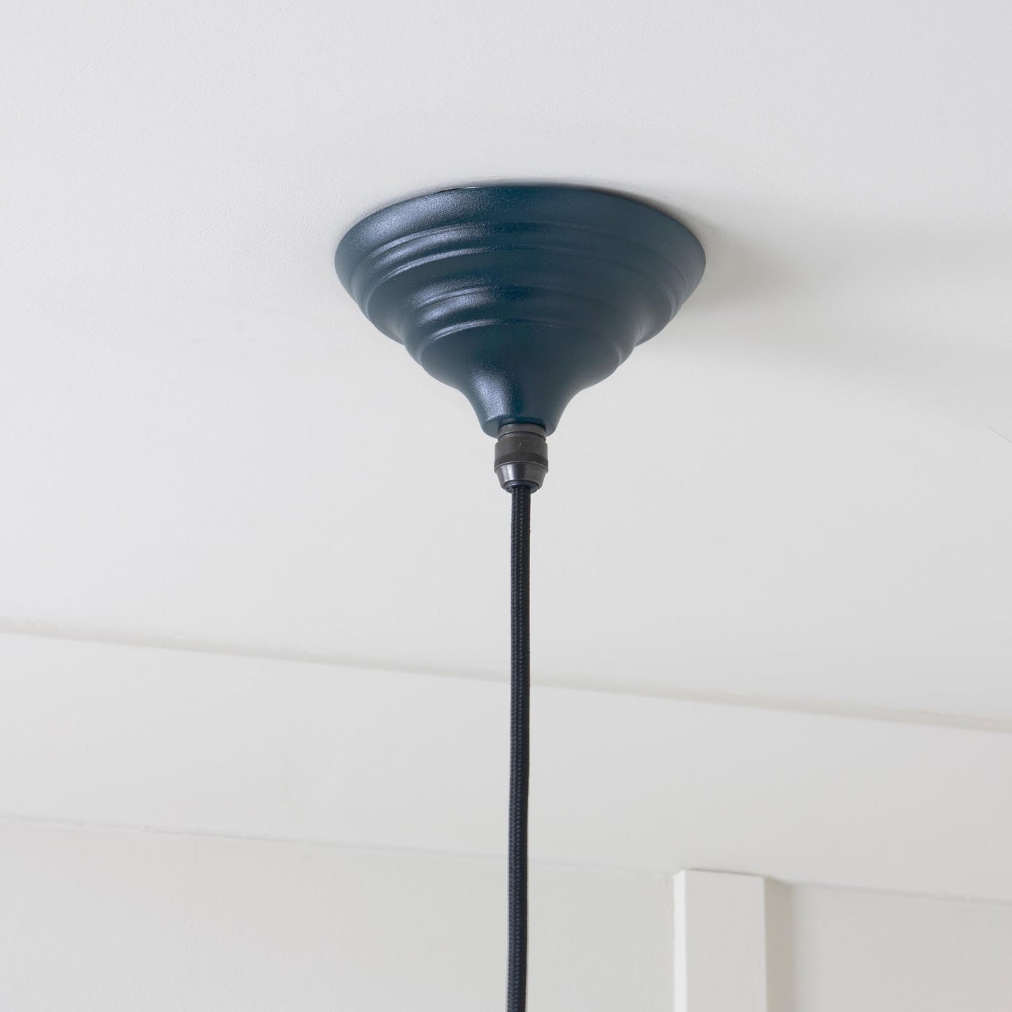 Smooth Nickel Brindley Pendant Light  Dusk, close up view of fitting and cable.