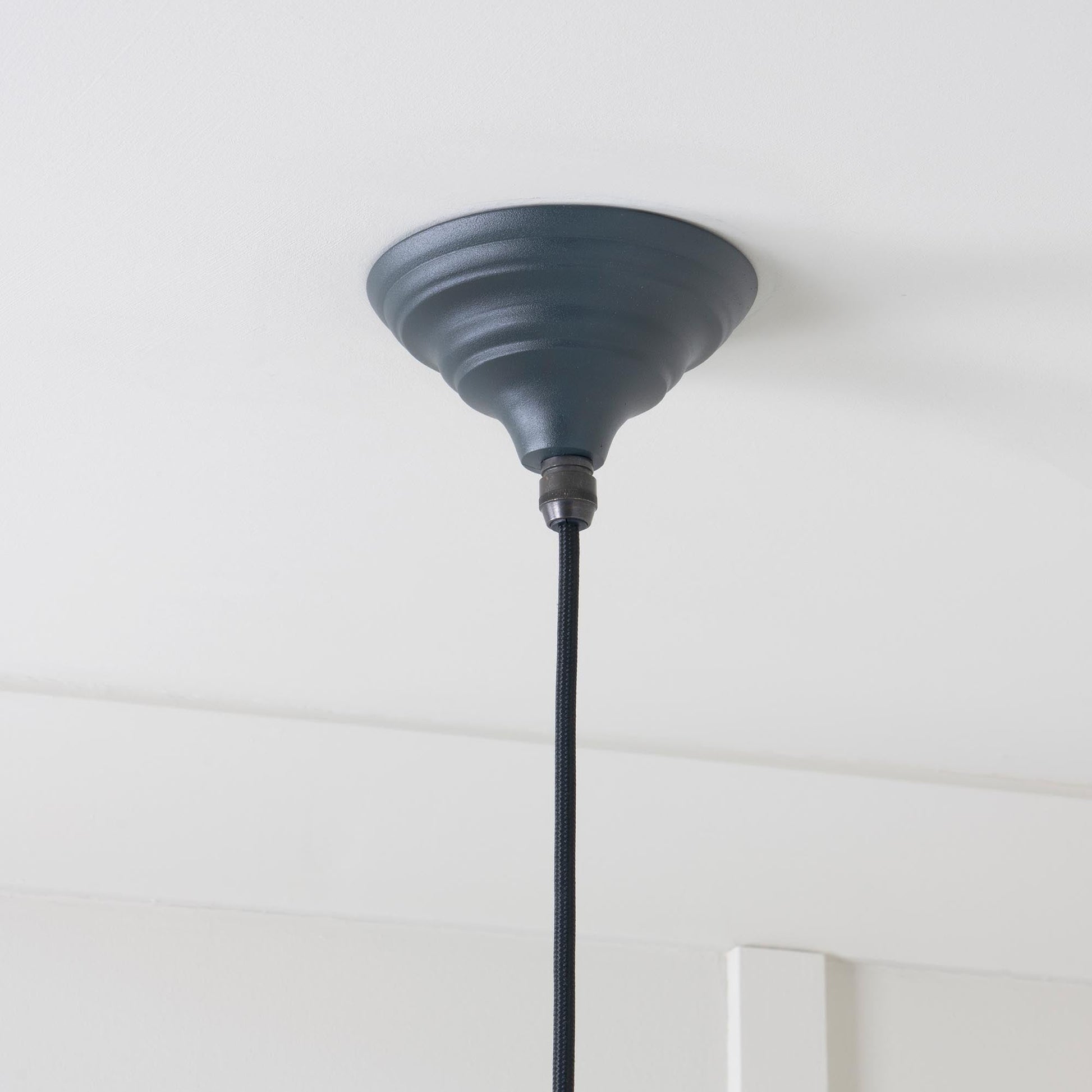 Smooth Brass Harborne Pendant Light Soot, close up view of fitting and cable.