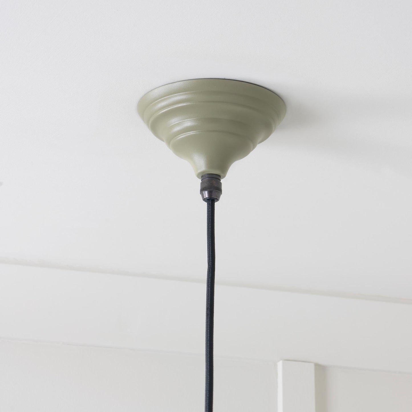 Hammered Brass Hockley Pendant Light Tump, close up view of fitting and cable.