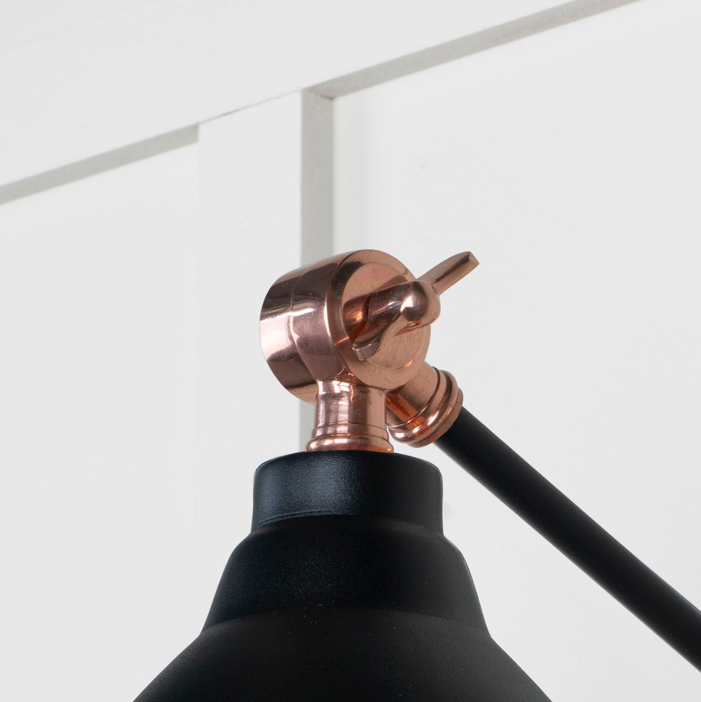 Smooth Copper Brindley Wall Light Elan Black, Detailed close up view of pendant.