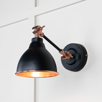 Smooth Copper Brindley Wall Light Elan Black, Front Side with light on.