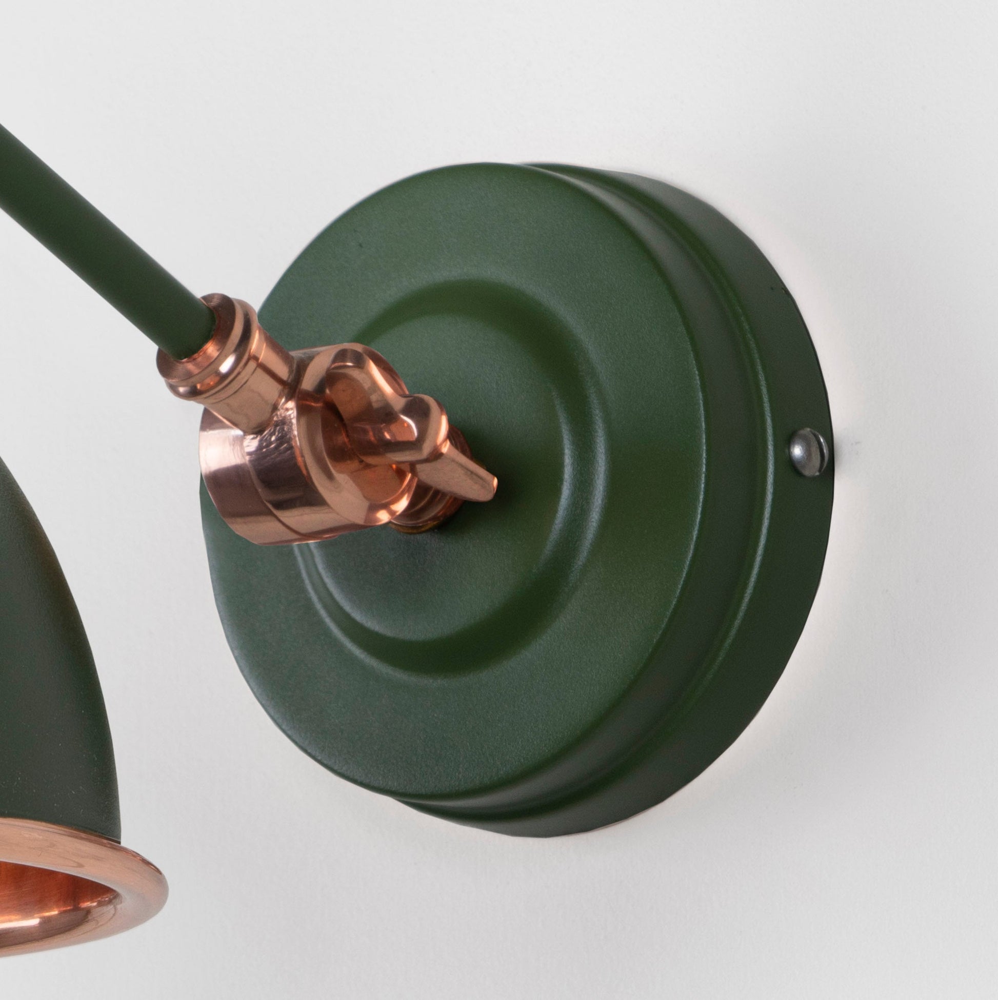 Smooth Copper Brindley Wall Light Heath, close up view of fitting and cable.