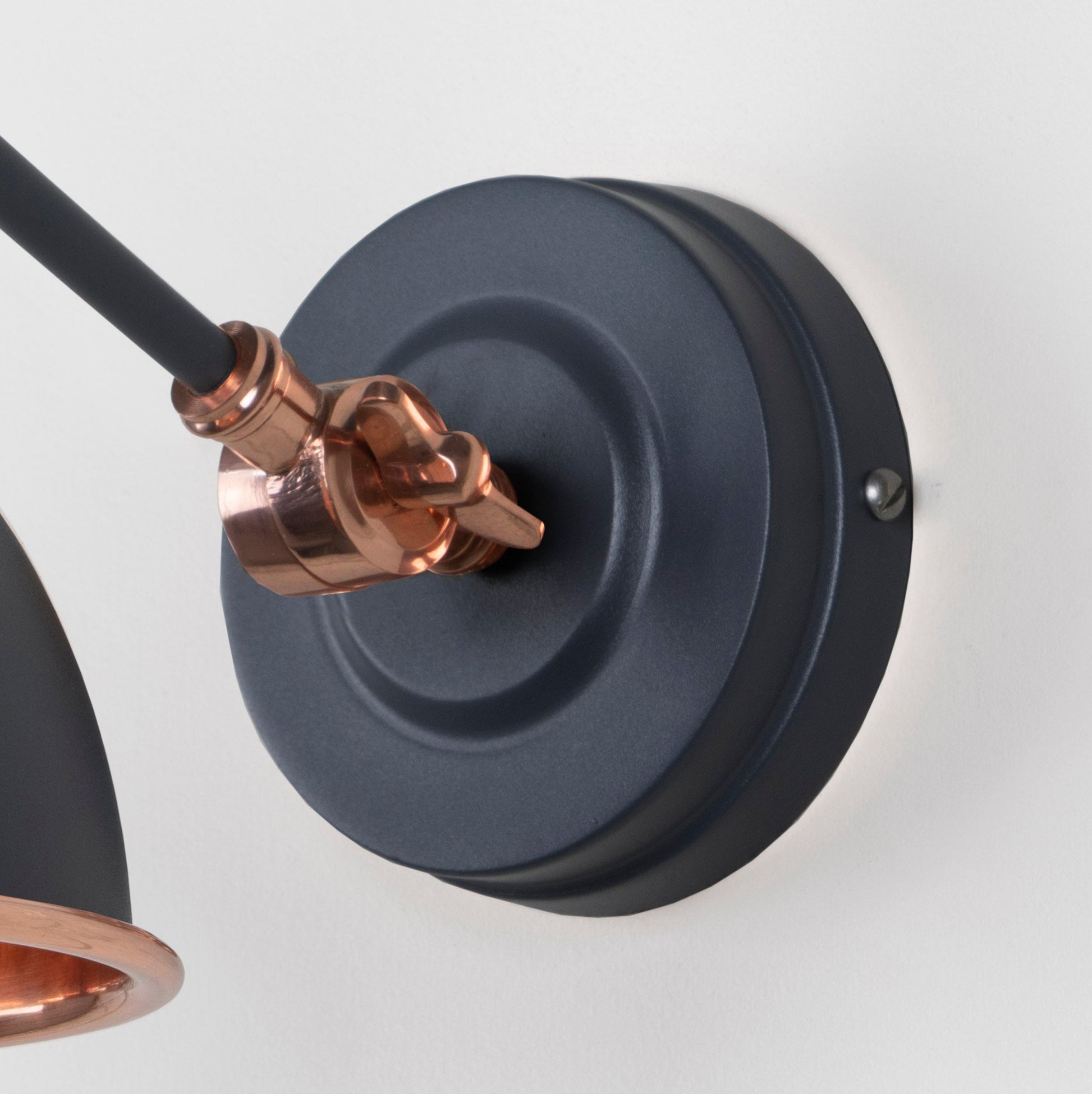 Smooth Copper Brindley Wall Light Slate, close up view of fitting and cable.
