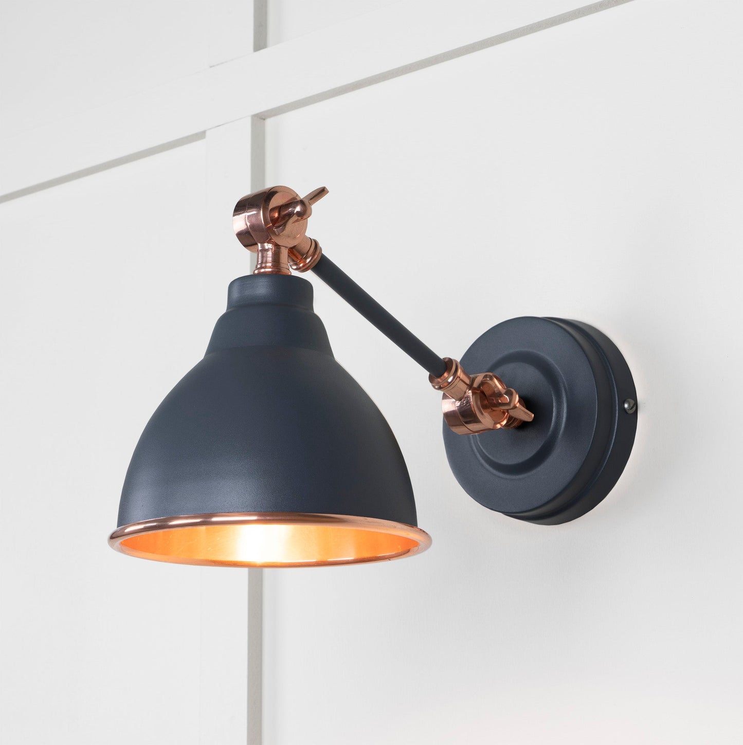 Smooth Copper Brindley Wall Light Slate, Front Side with light on.