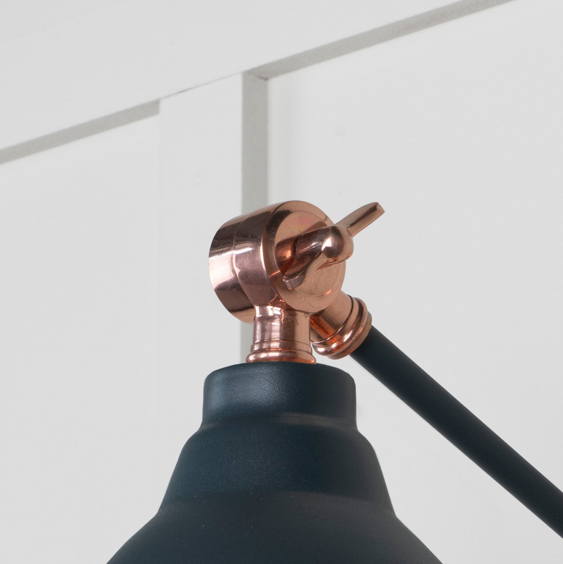 Smooth Copper Brindley Wall Light Soot, Detailed close up view of pendant.