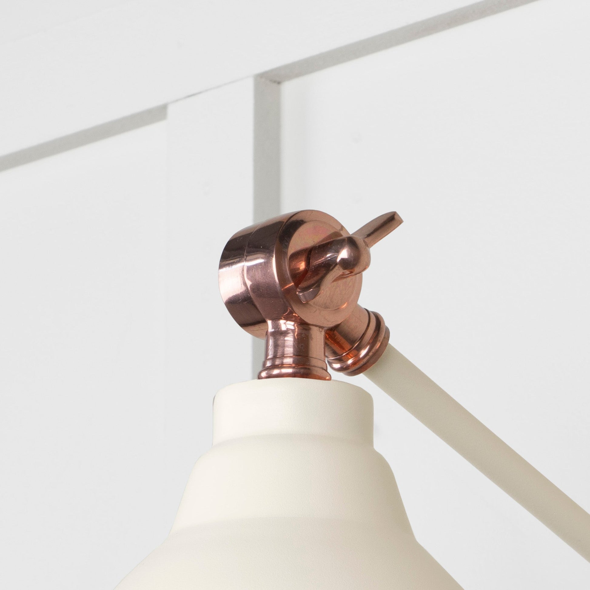 Smooth Copper Brindley Wall Light Teasel, Detailed close up view of pendant.