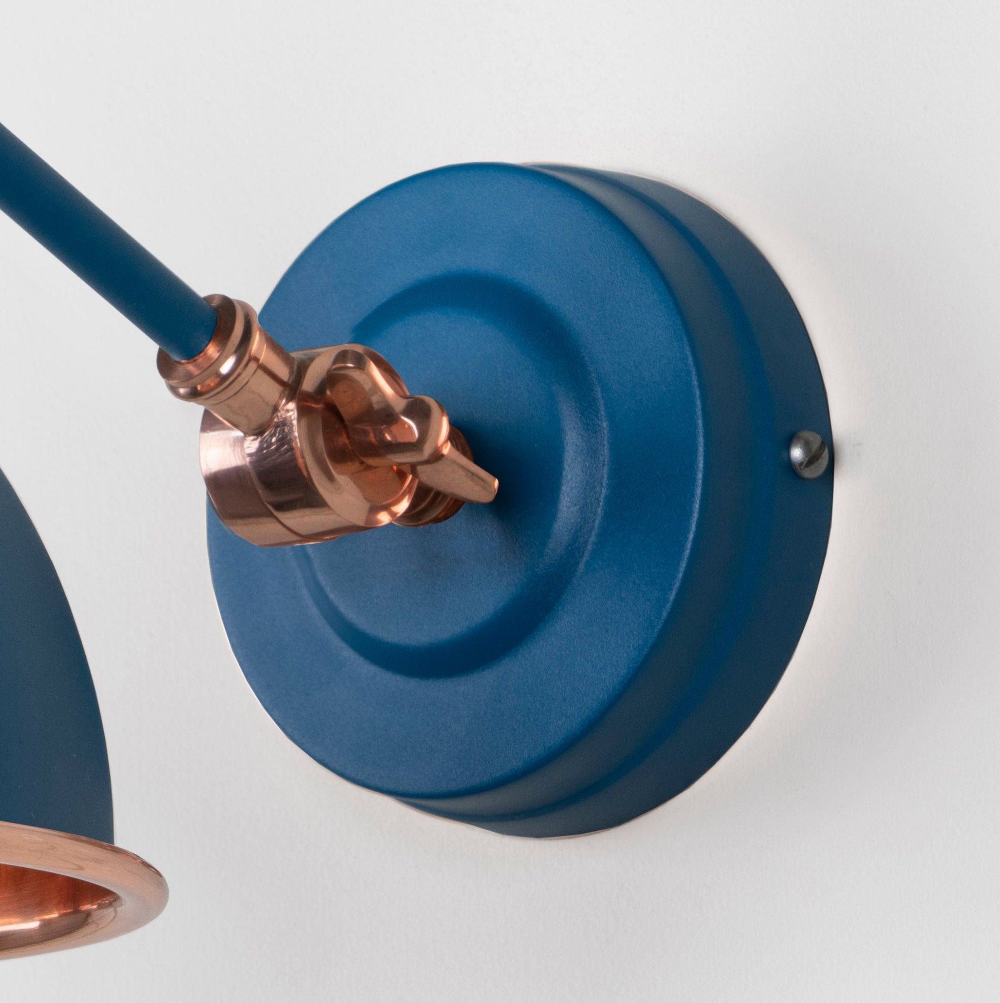 Smooth Copper Brindley Wall Light Upstream, close up view of fitting and cable.