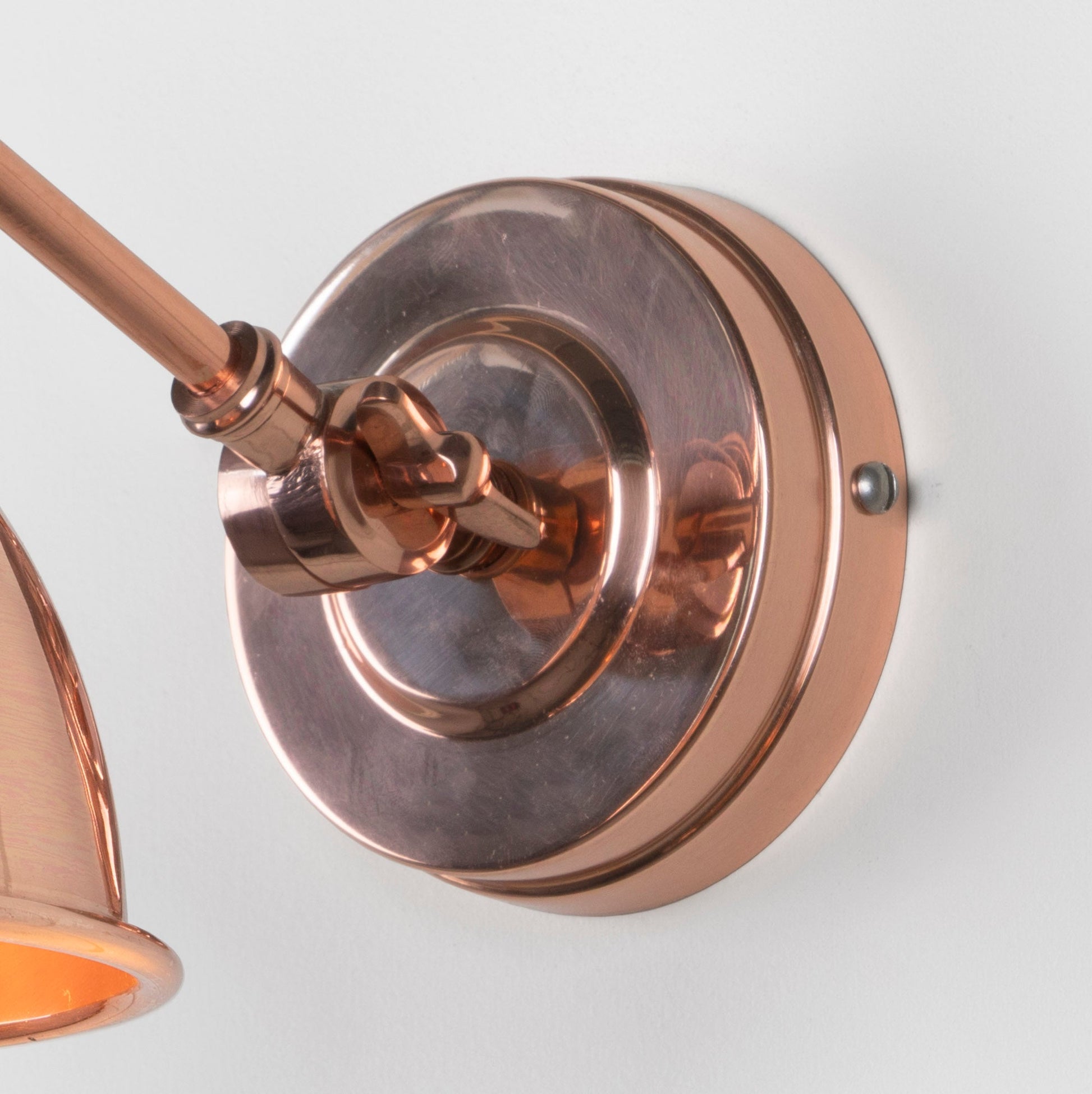 Smooth Copper Brindley Wall Light , close up view of fitting and cable.