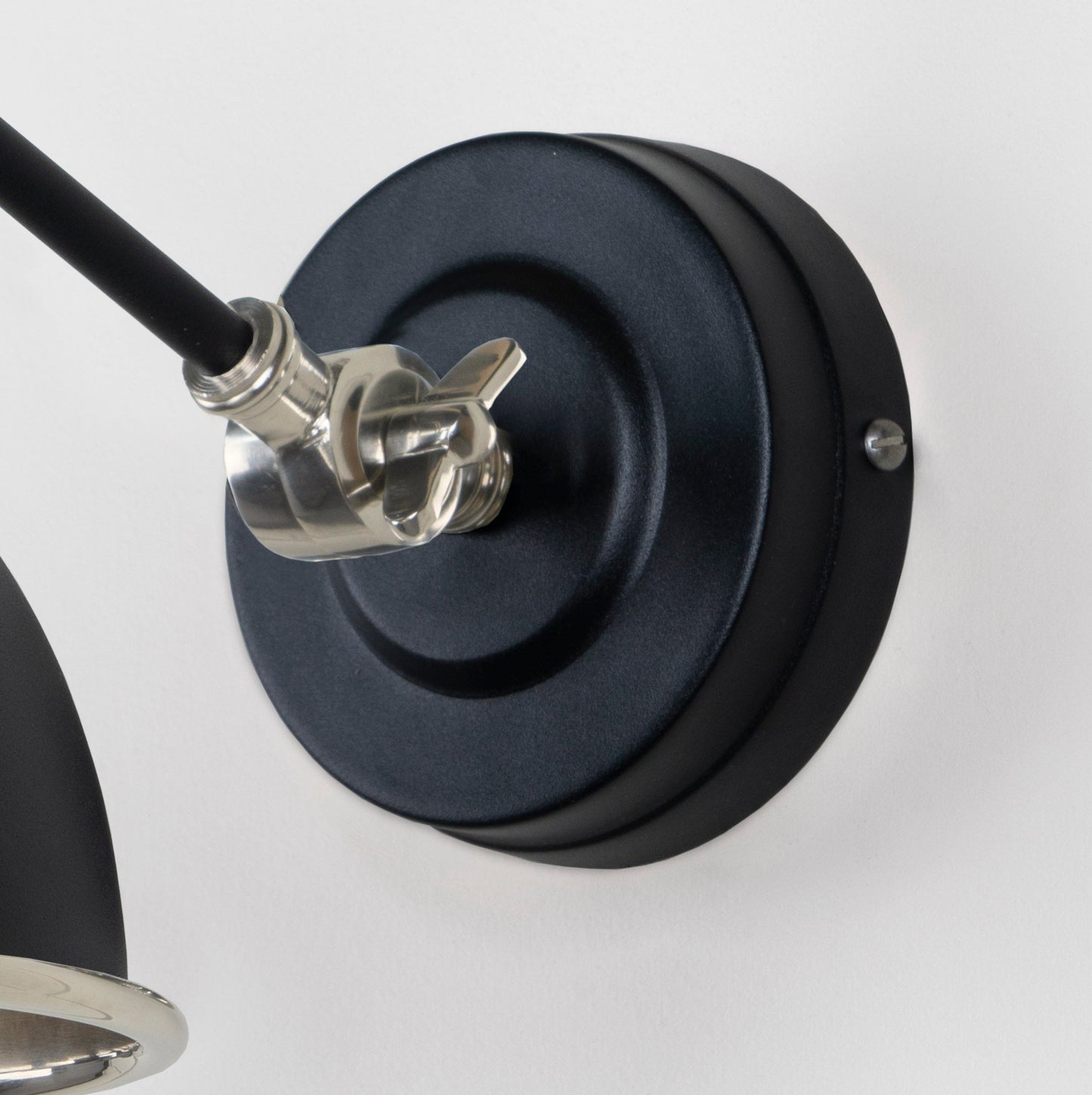 Hammered Nickel Brindley Wall Light Elan Black, close up view of fitting and cable.