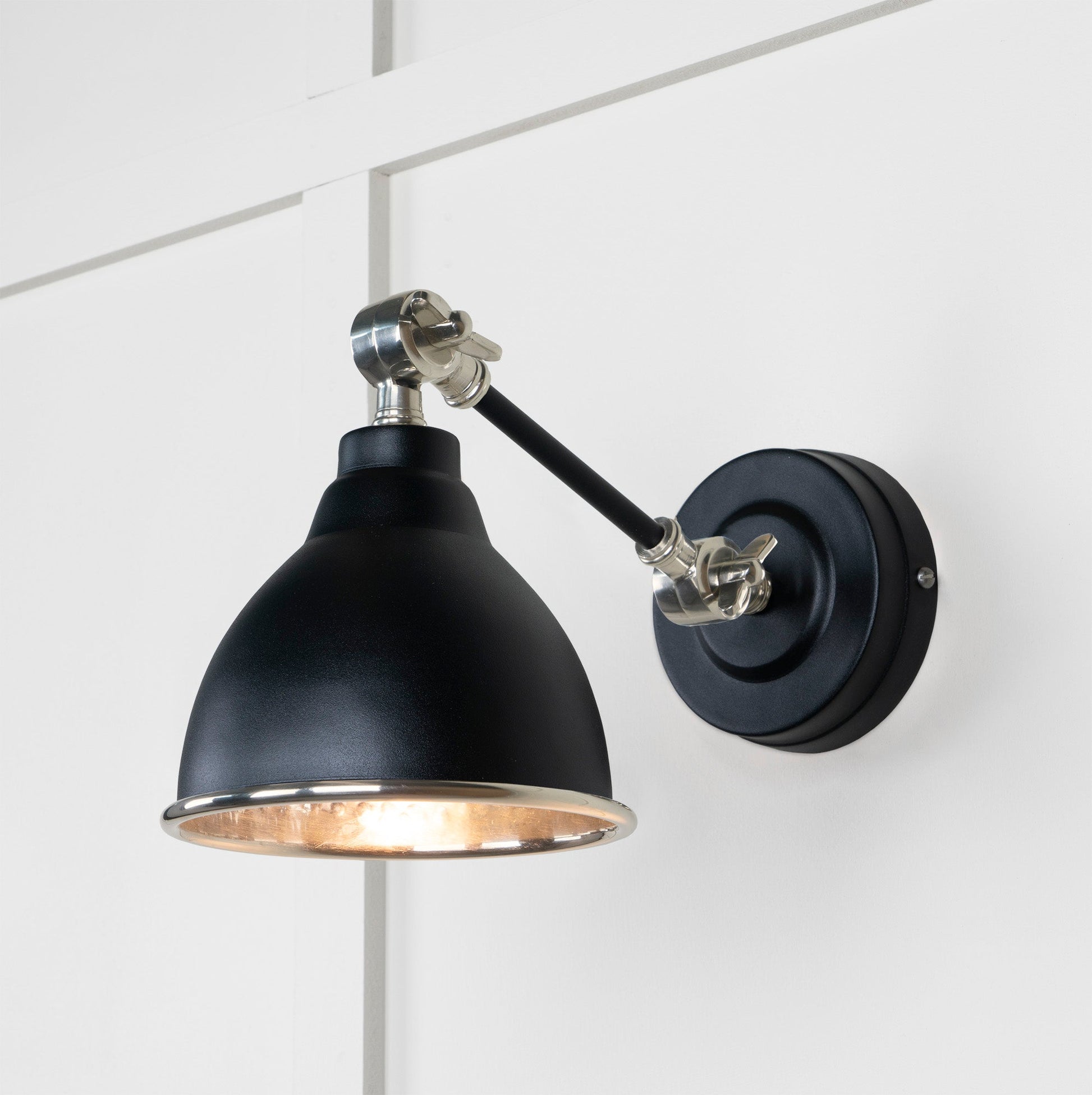 Hammered Nickel Brindley Wall Light Elan Black, Front Side with light on.