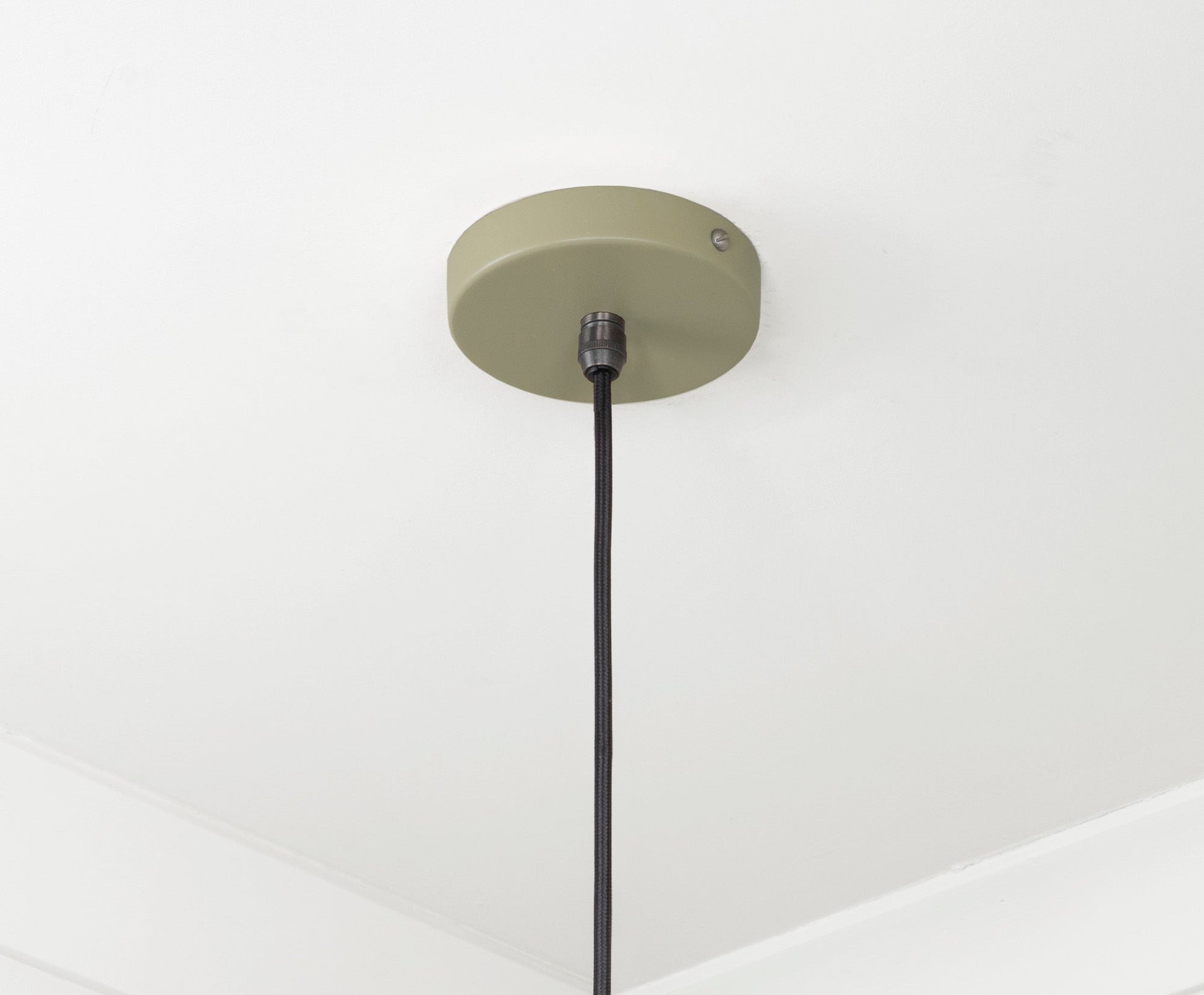 Smooth Brass Frankley Pendant Light Tump, close up view of fitting and cable.