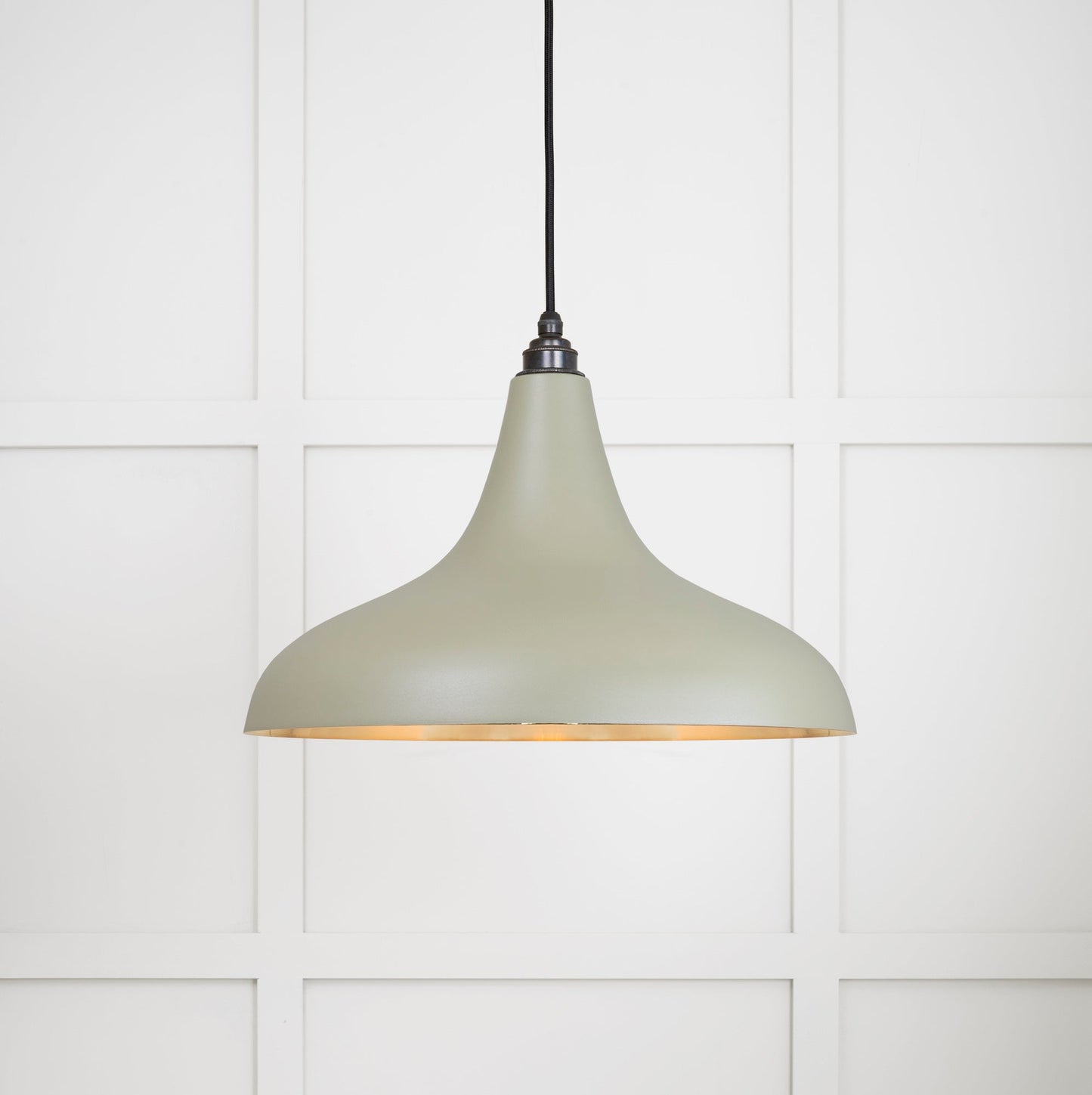 Smooth Brass Frankley Pendant Light Tump, Front Side with light on.