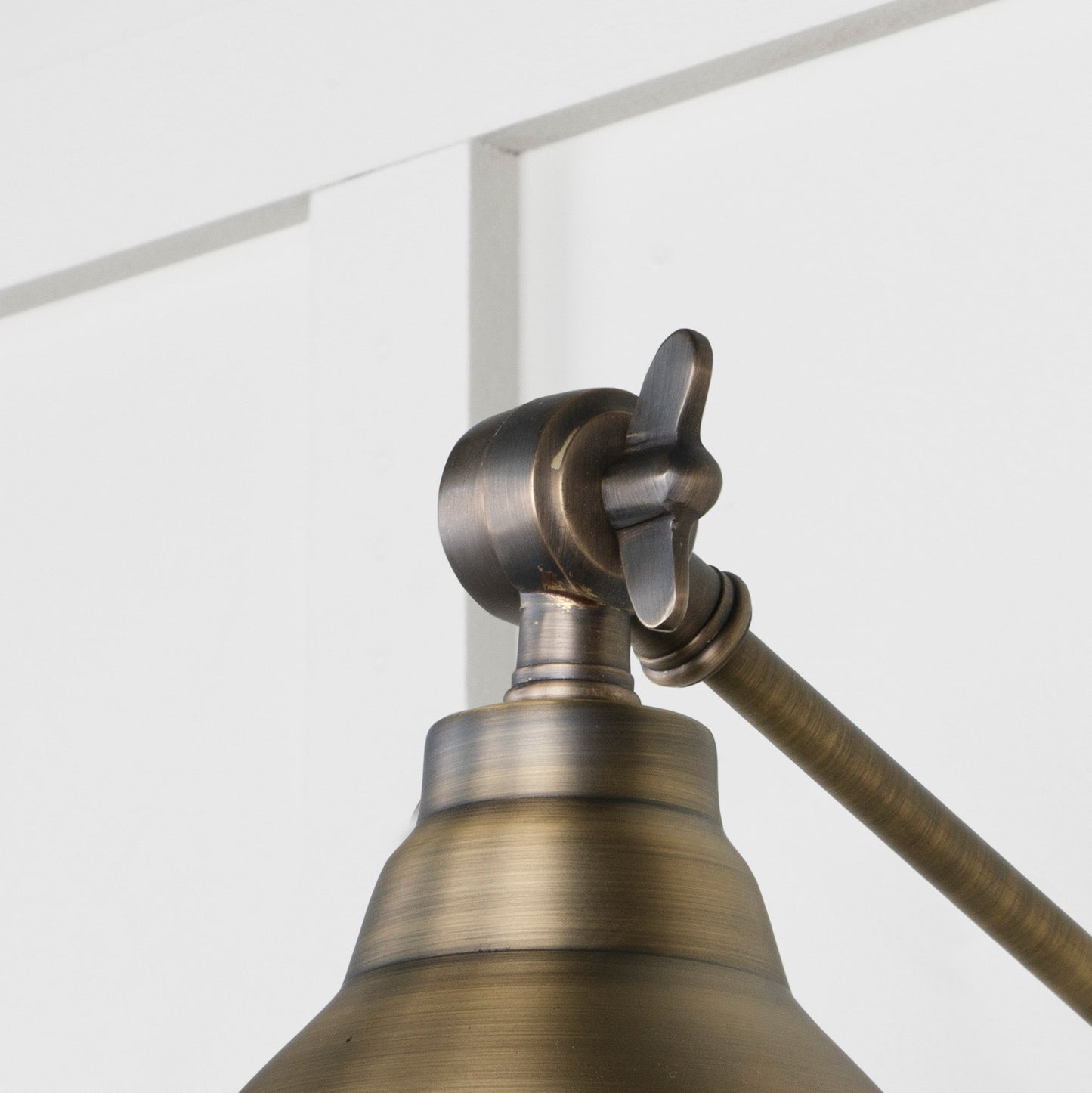 Aged Brass Brindley Wall Light , Detailed close up view of pendant.