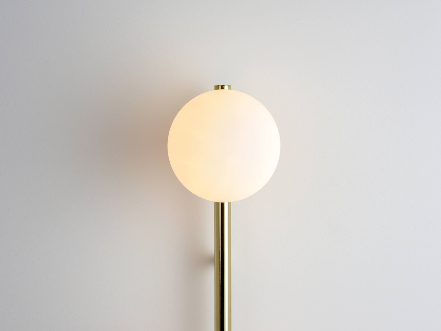 brass Bar Opal Ball Wall Light, close up opal shades.