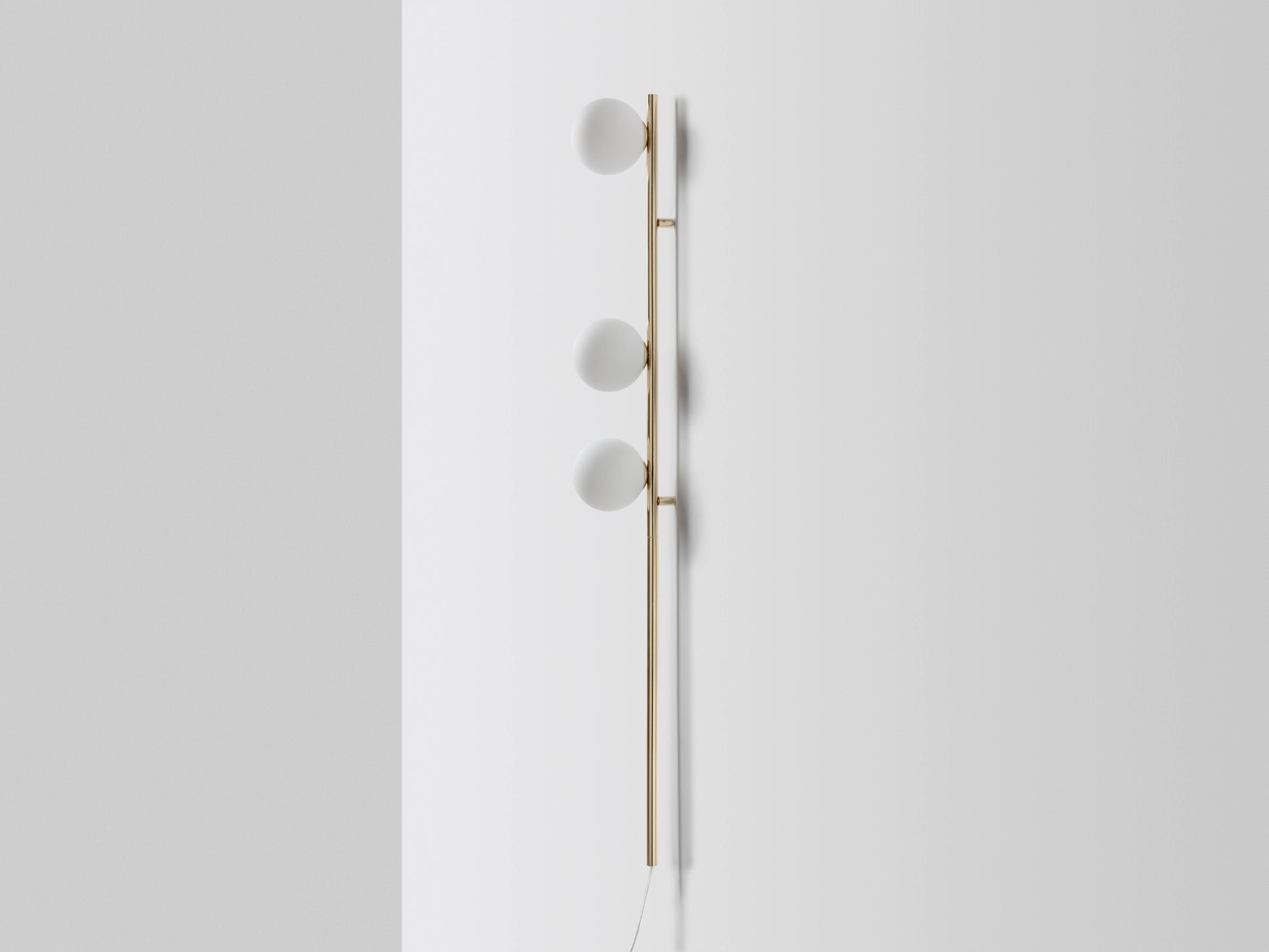 brass Bar Opal Ball Wall Light, side view.