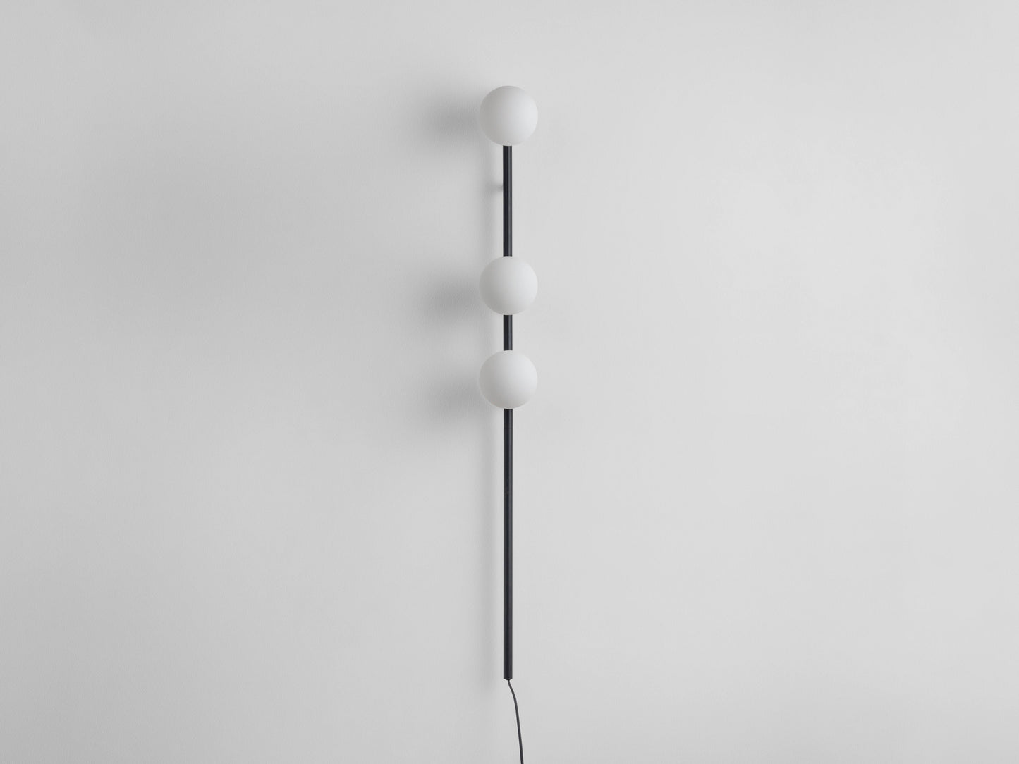 Charcoal grey Bar Opal Ball Wall Light, front view.