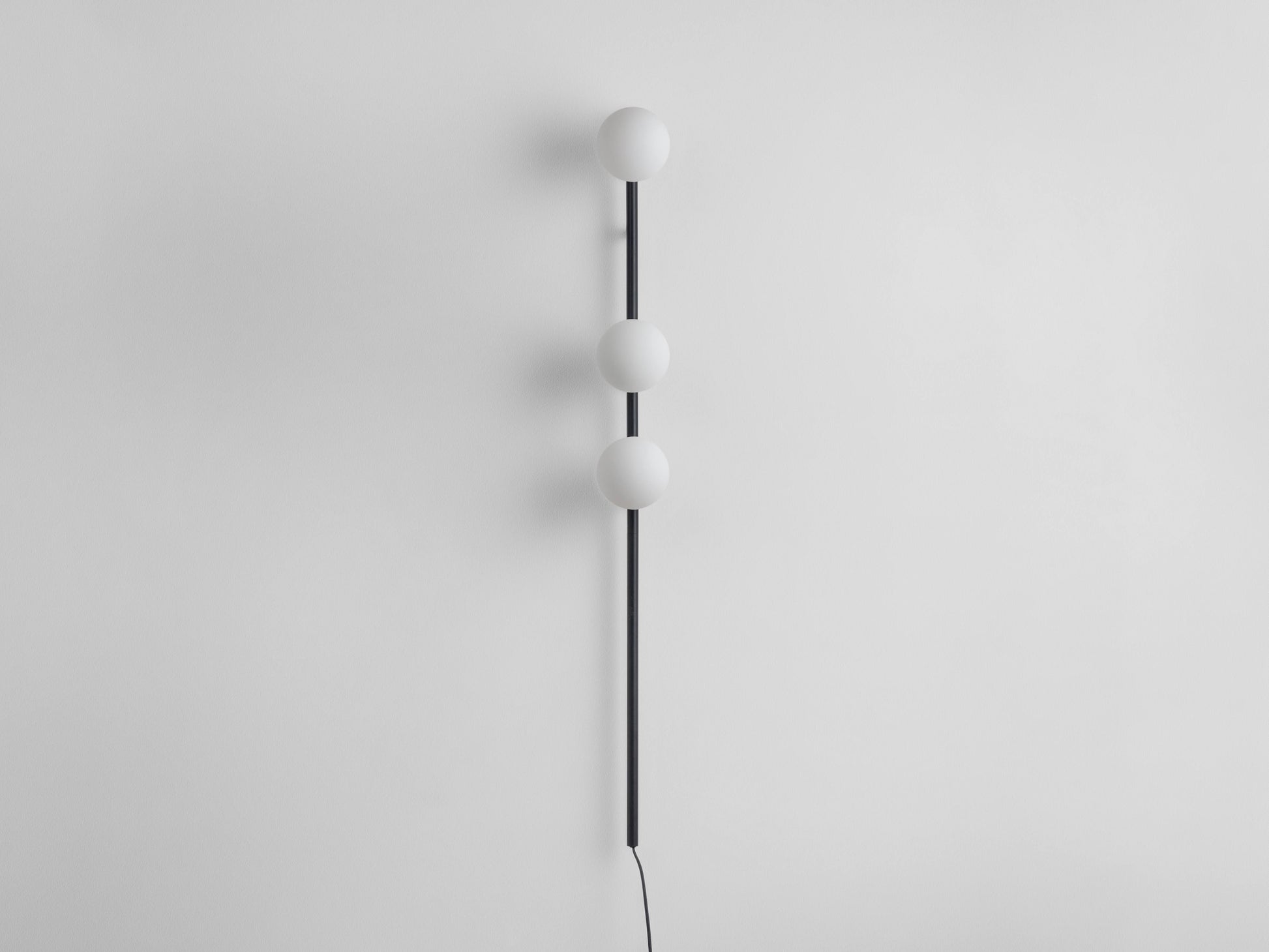 Charcoal grey Bar Opal Ball Wall Light, front view.