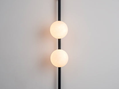 Charcoal grey Bar Opal Ball Wall Light, close up of opal shades.