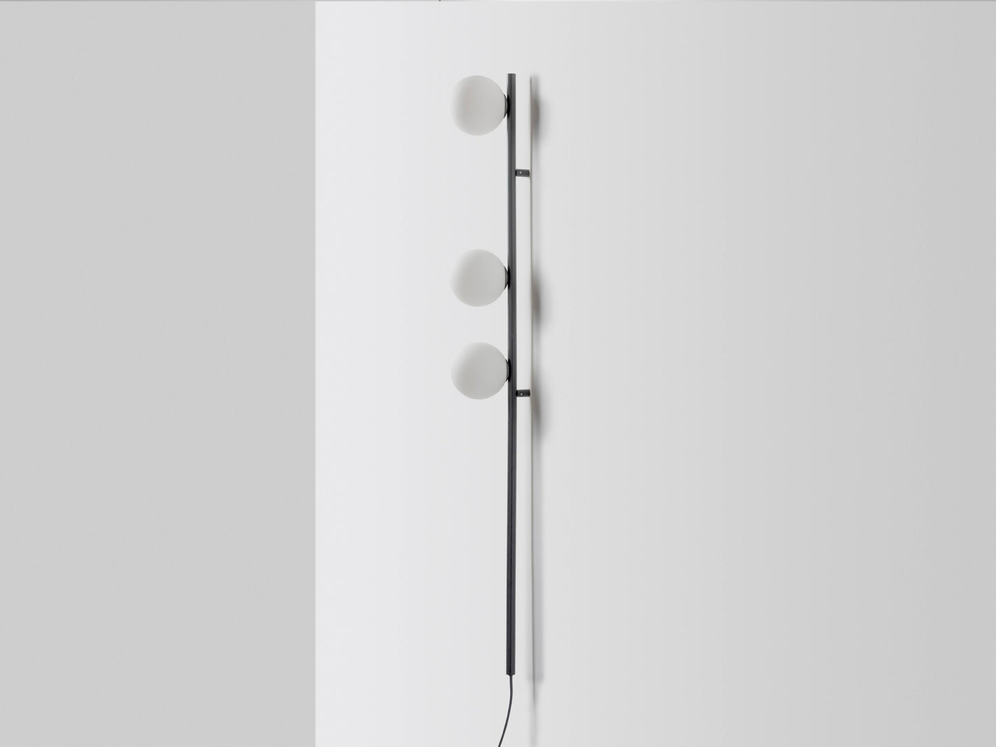 Charcoal grey Bar Opal Ball Wall Light, side view.