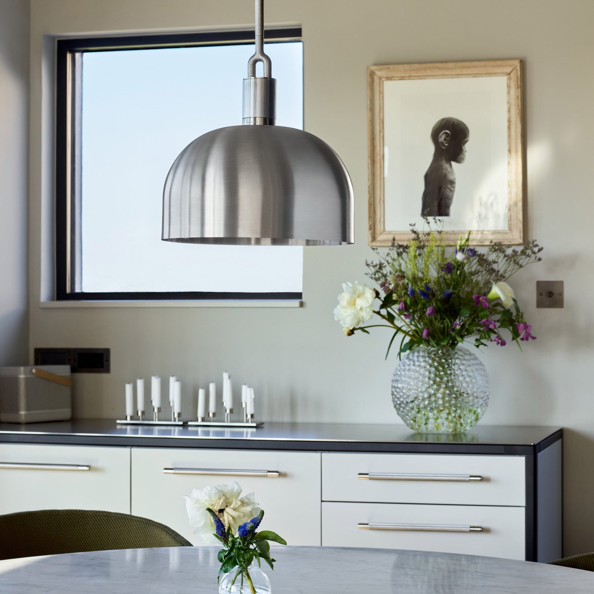 Forked Pendant Light / Shade / Large steel, close up in dining room setting.