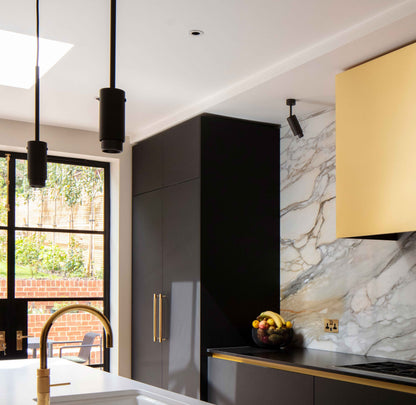 Exhaust Pendant Light / Linear / Graphite Gun Metal, hanging above kitchen island.