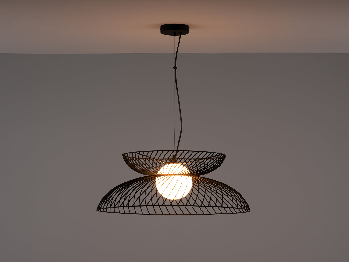 Charcoal Grey Cage Ceiling Light, light on front view.