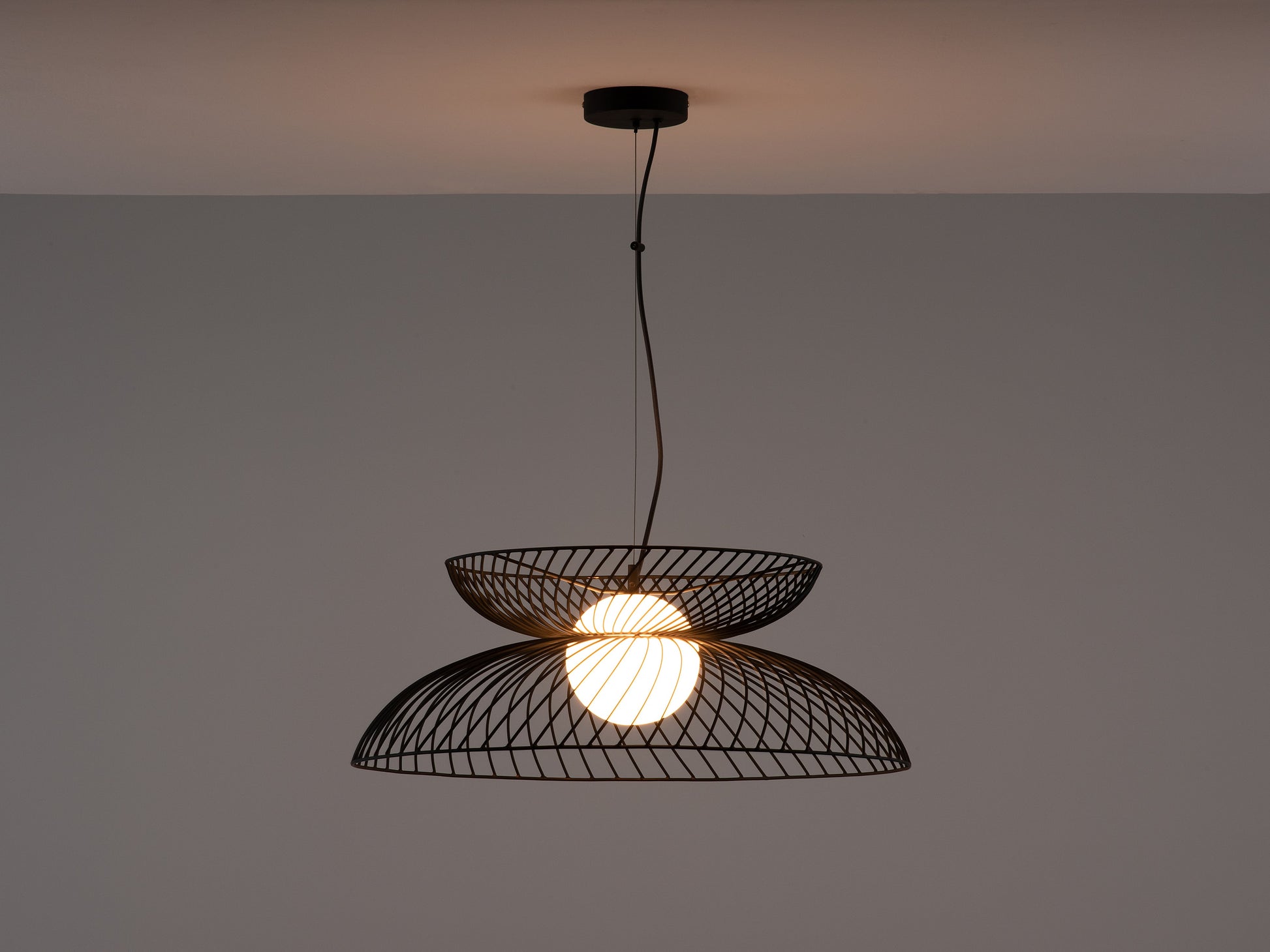 Charcoal Grey Cage Ceiling Light, light on front view.