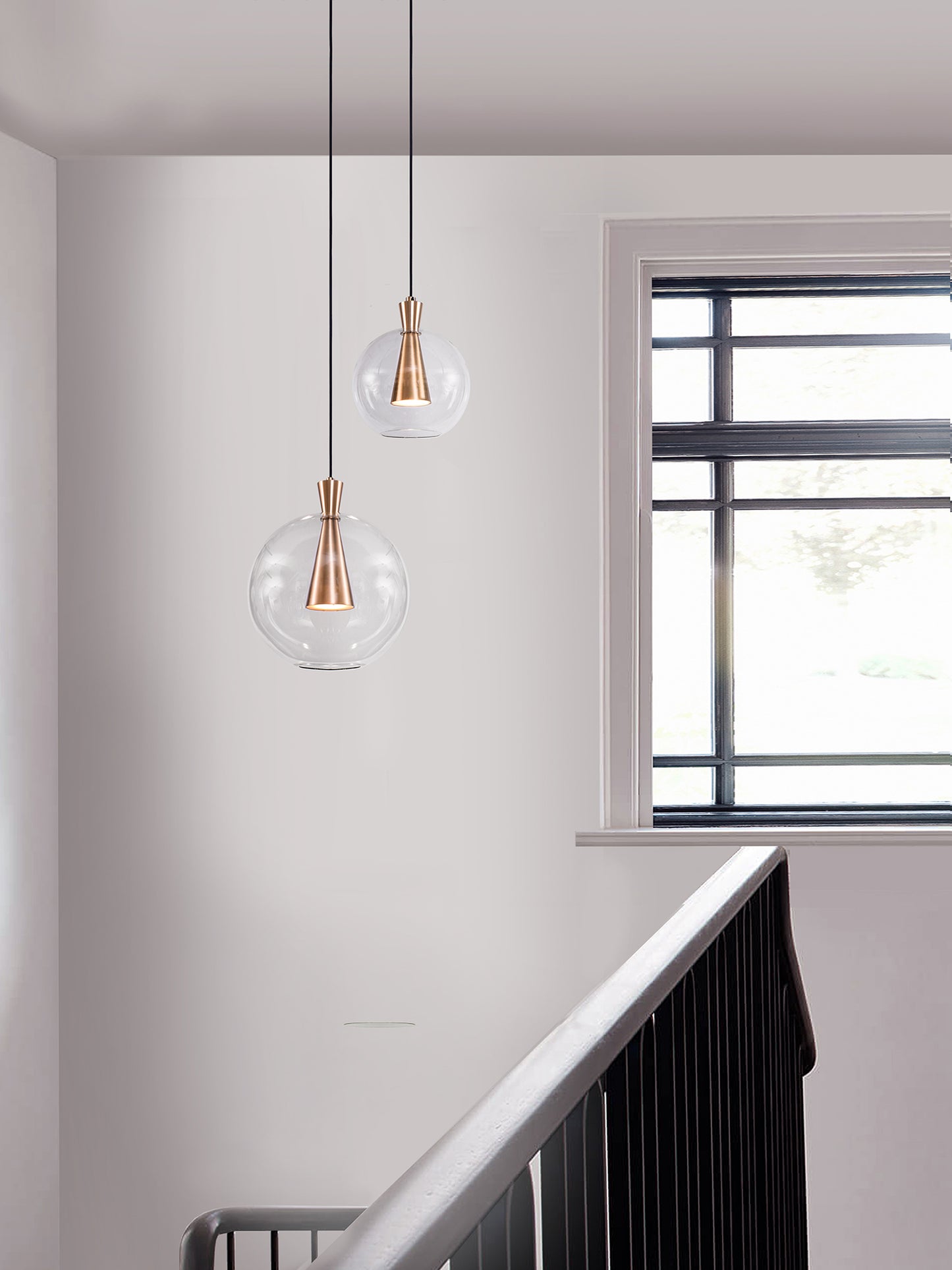 Cone Shade Pendant Light, hanging from ceiling above stairs.