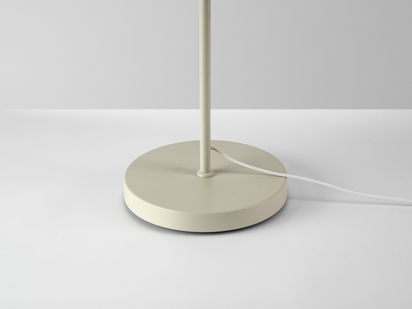 sand Opal Disk Floor Lamp, stand close up view.