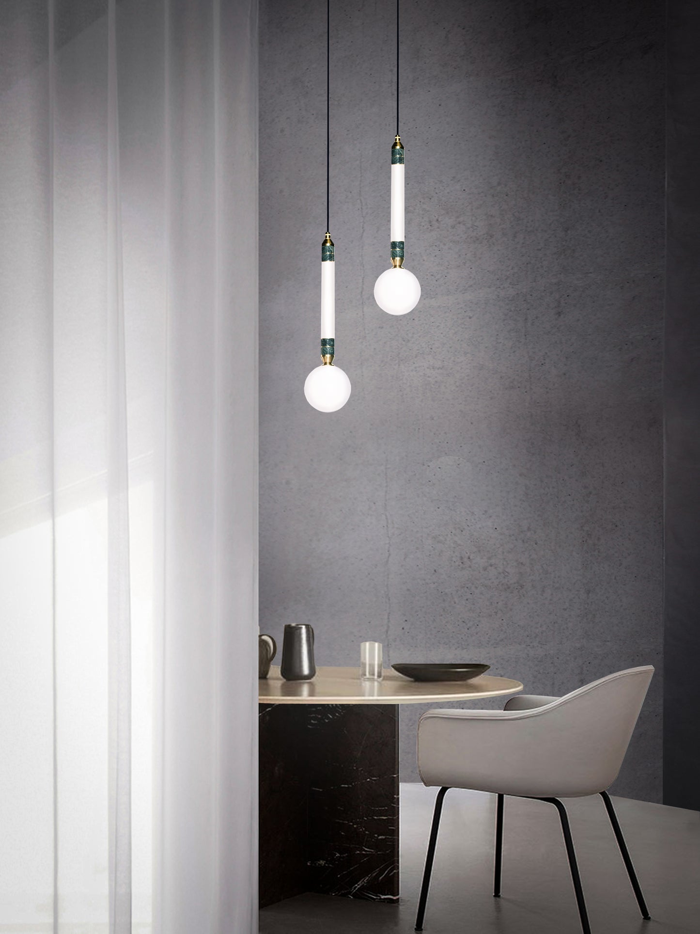 Greenstone Small Pendant Light, hanging from ceiling above table.