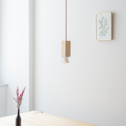 Lamp One Pendant Light / Brass, in dining room setting.