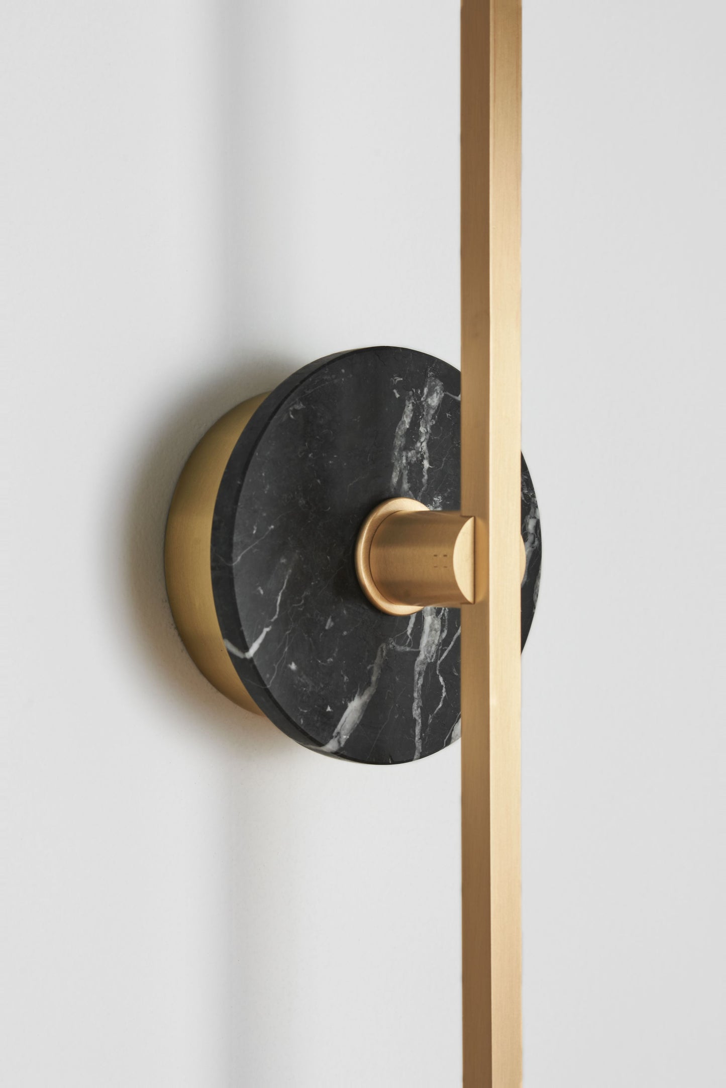 Stick Wall Light brass & Black marble, close up of fitting