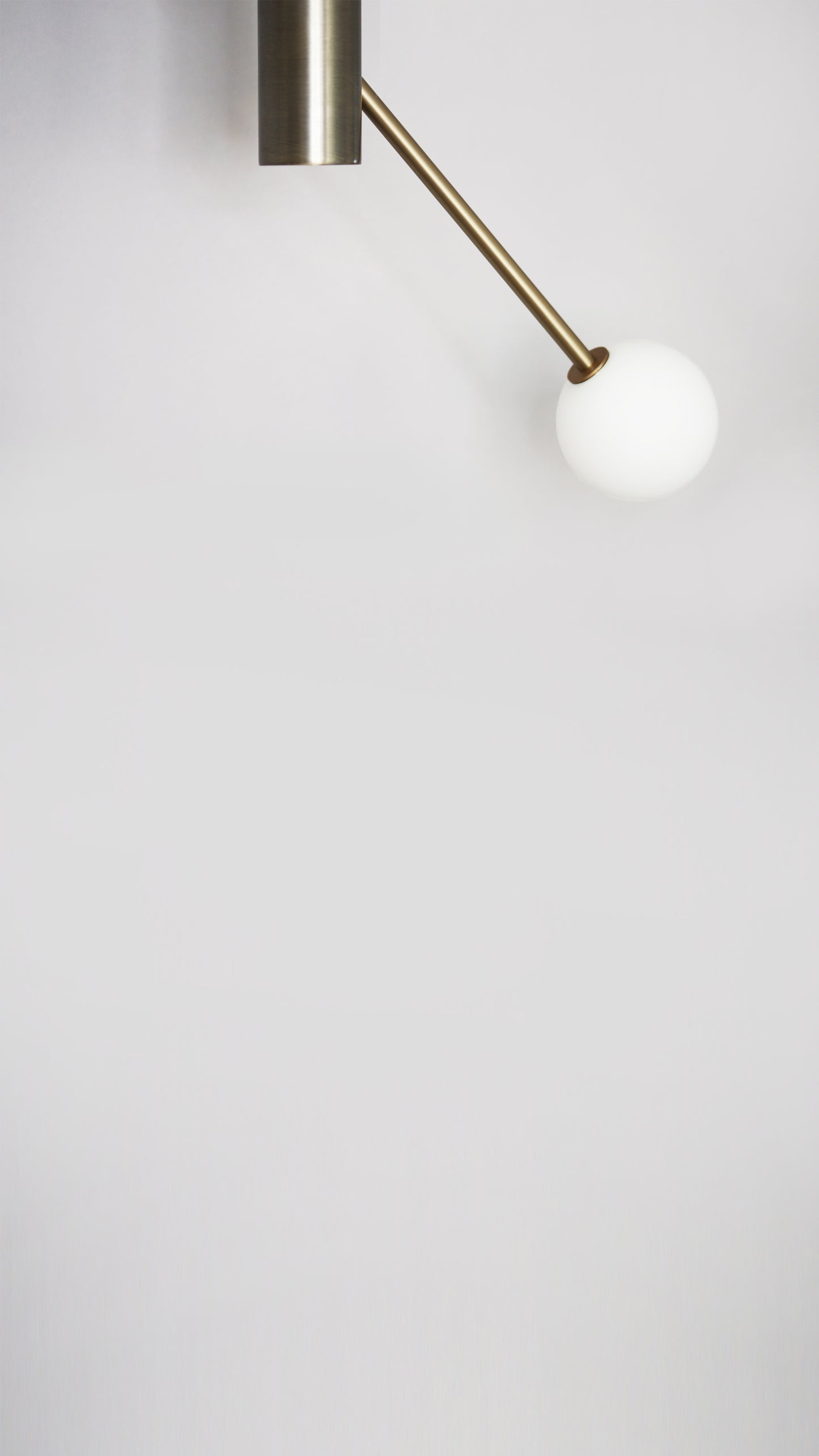 Pole Dance Pendant Light, close up view of smaller globe.