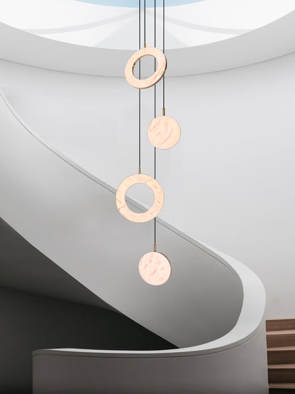 Rosa Ring 4 Cluster Light, hanging from ceiling above stairs in setting.