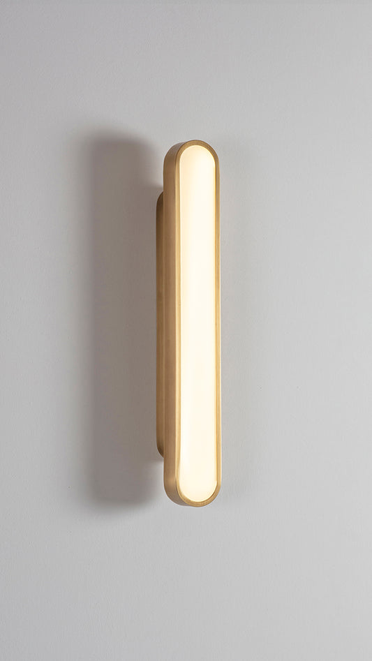 Capsule Wall Light brushed brass, front view on.