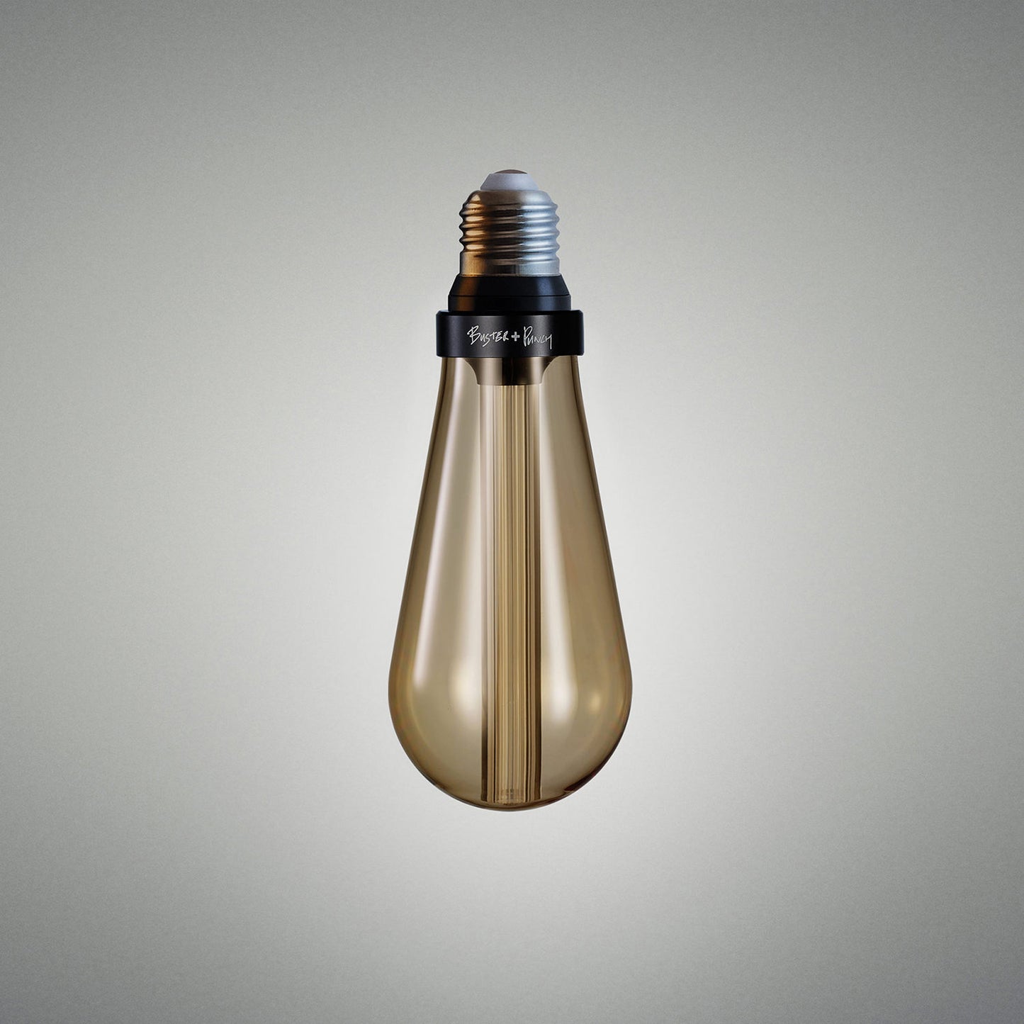 Buster Bulb Gold grey background 