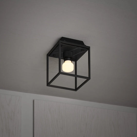 Caged Ceiling Light / Small in black marble, on side view.