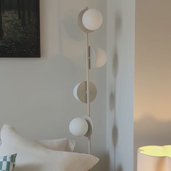 sand Opal Disk Floor Lamp, in setting and close up video.