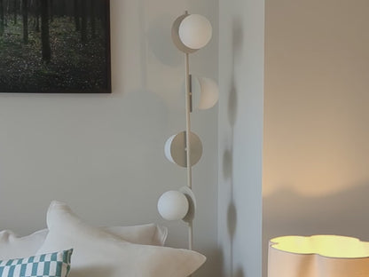 sand Opal Disk Floor Lamp, in setting and close up video.